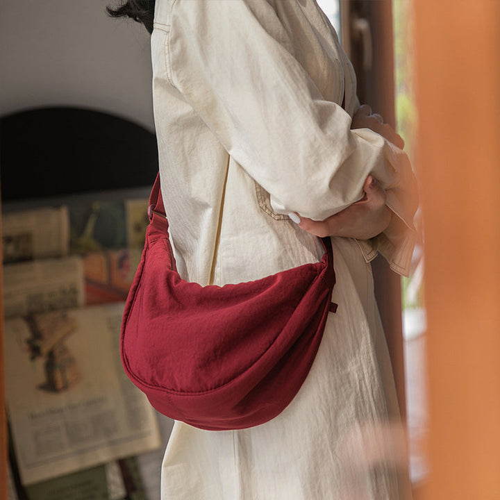 Tegan – Slanke Gebogen Schoudertas dames