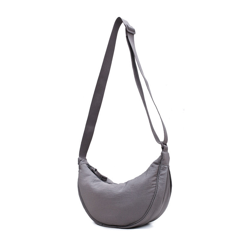 Tegan – Slanke Gebogen Schoudertas dames