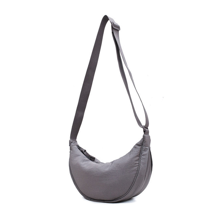 Tegan – Slanke Gebogen Schoudertas dames