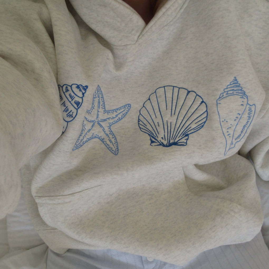 Dames hoodie met schelpenprint