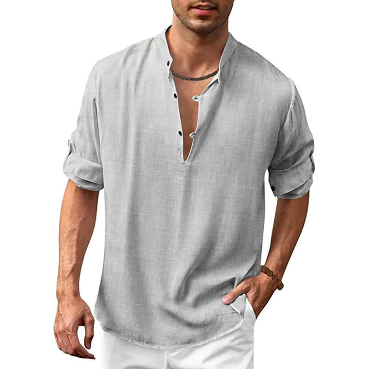 Grijs herenoverhemd met opgerolde mouwen, V-hals en knoopsluiting. Stijlvol en casual ontwerp, ideaal voor modieuze mannen.