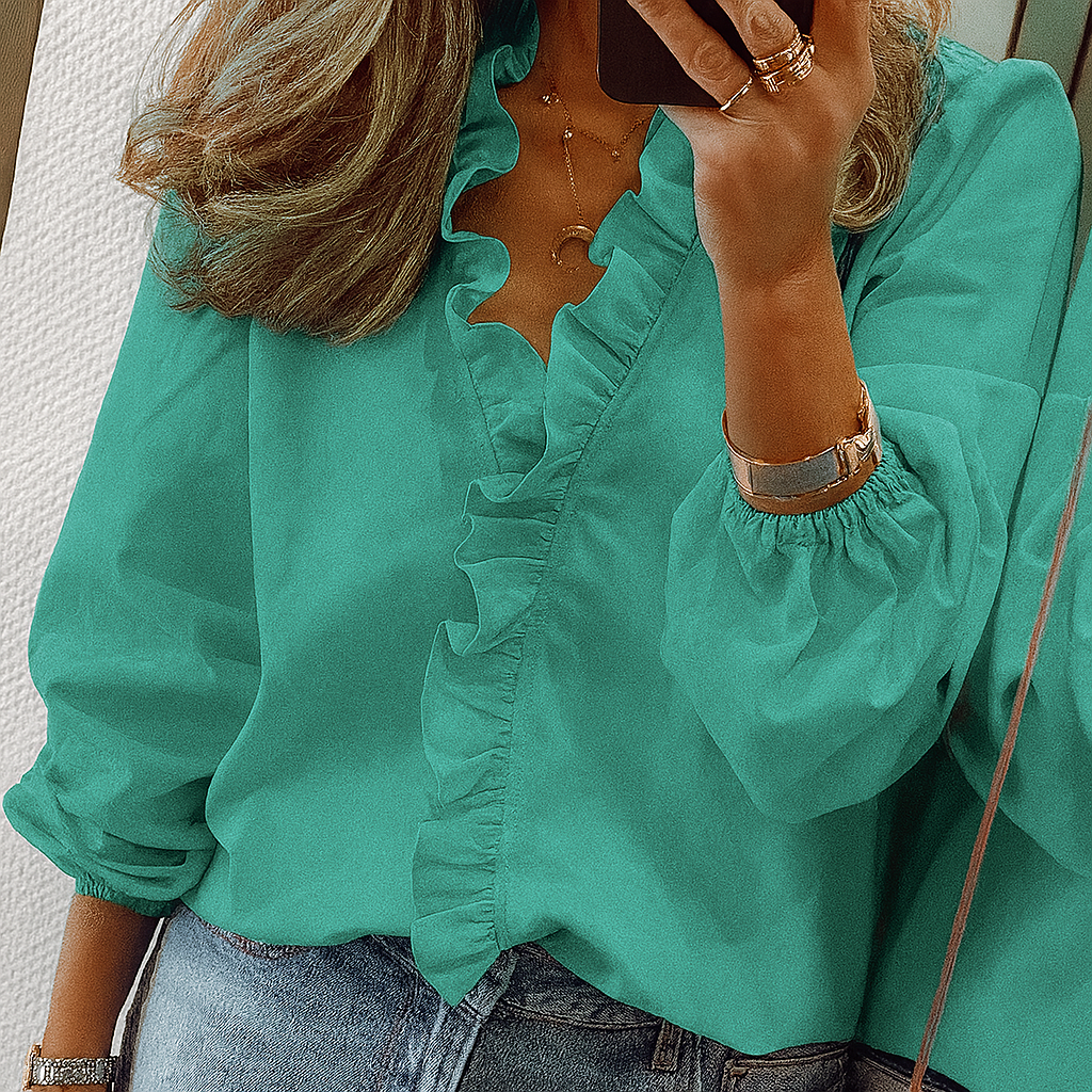 Blouse met blauwe ruches en pofmouwen