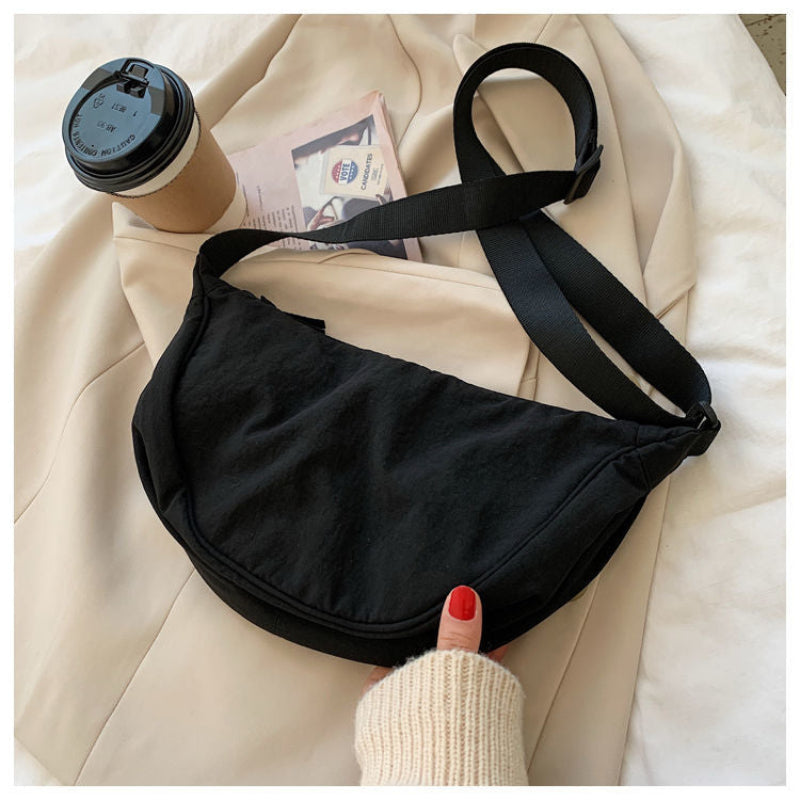 Tegan – Slanke Gebogen Schoudertas dames