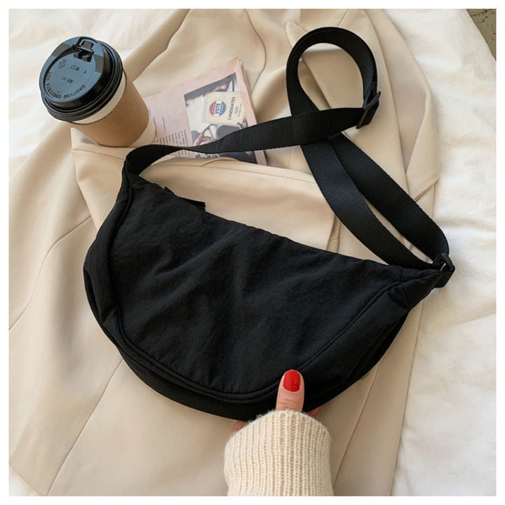 Tegan – Slanke Gebogen Schoudertas dames