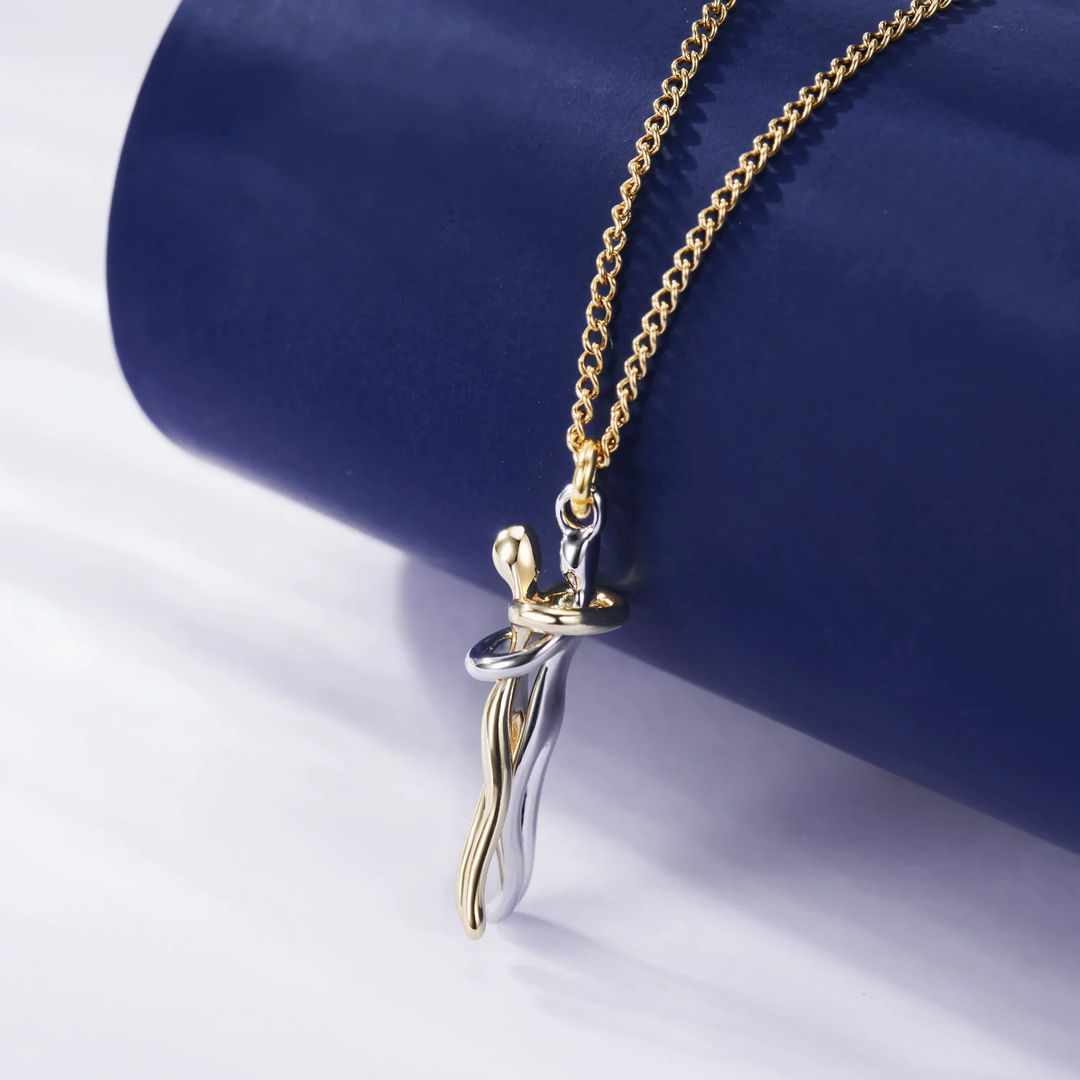 Gouden omhelzing paar hanger ketting
