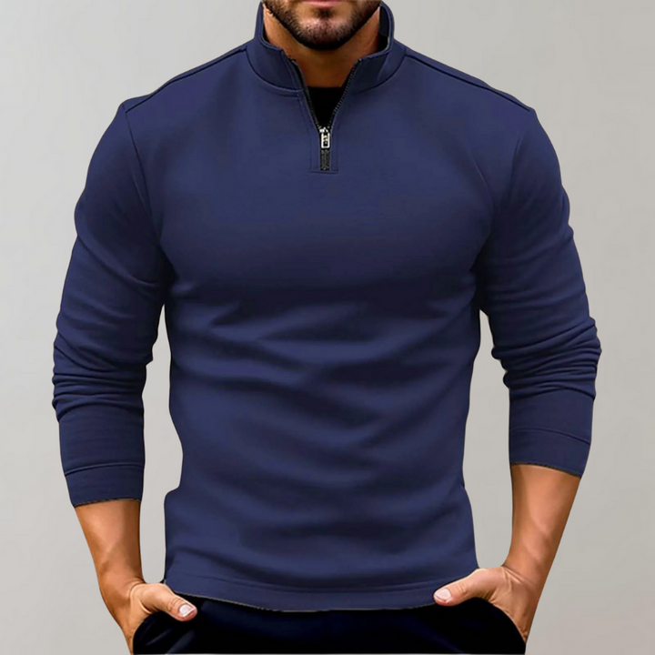 Donkerblauwe heren trui met halve rits, lange mouwen en moderne pasvorm. Perfect voor casual en zakelijke outfits. Comfortabele en stijlvolle herenkleding.