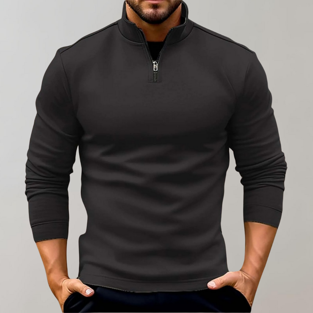 Zwarte heren trui met halve rits, lange mouwen en moderne pasvorm. Perfect voor casual en zakelijke outfits. Comfortabele en stijlvolle herenkleding.