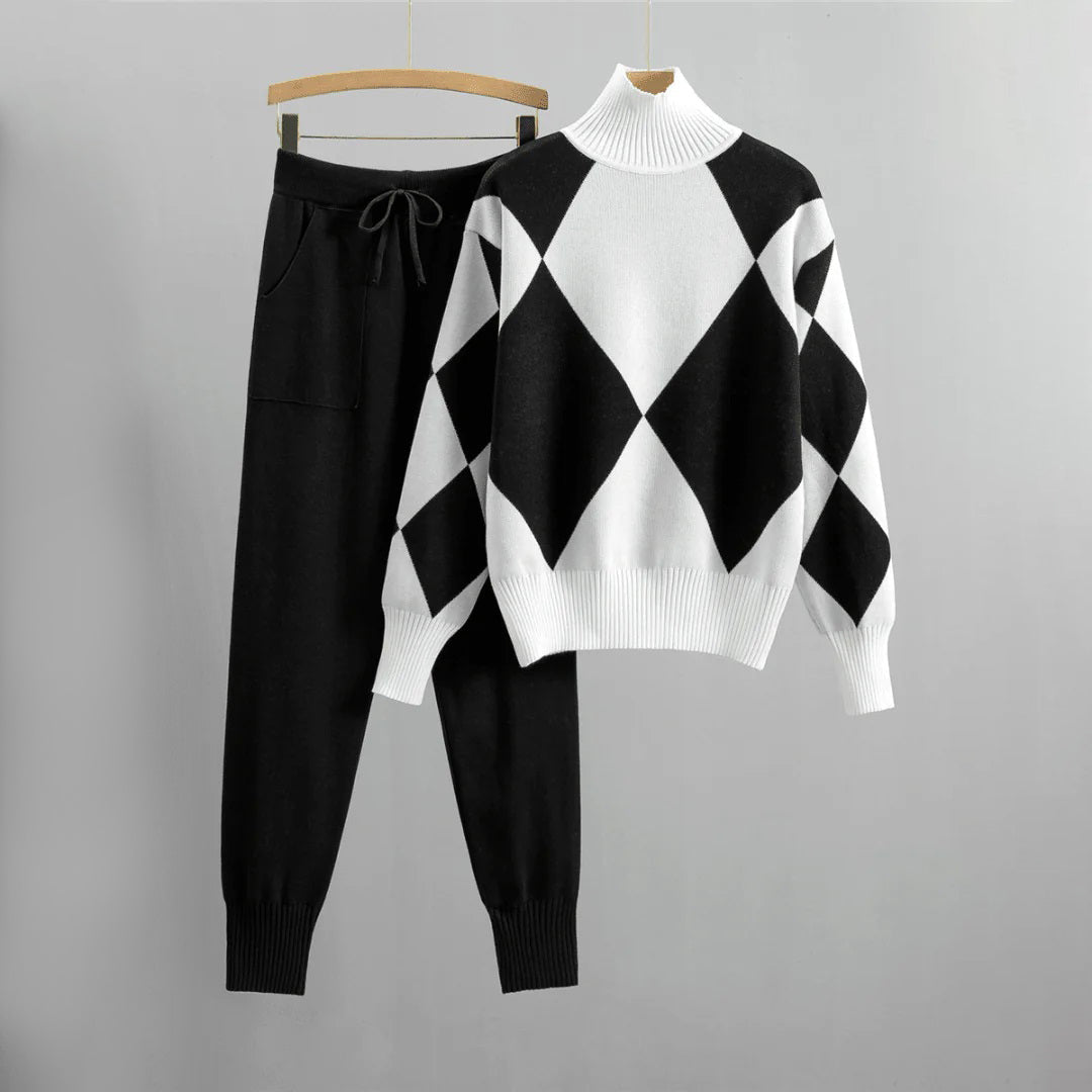 Zwart damespak met joggingbroek en trui