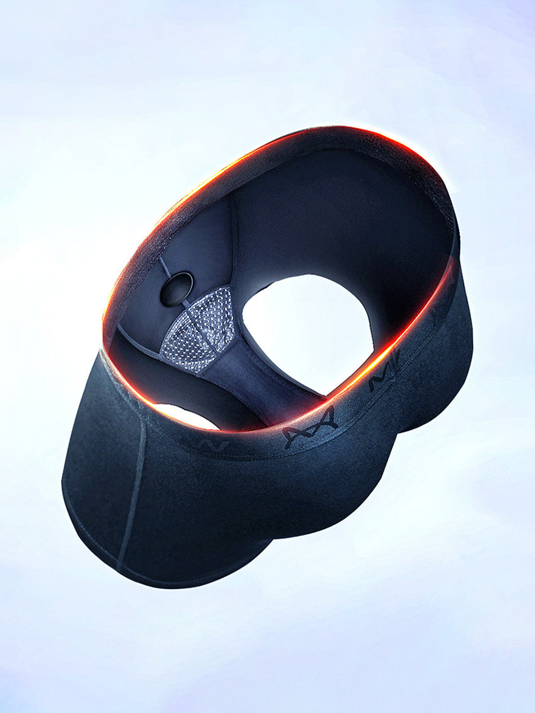 Black, ergonomic VR headset with orange accents, floating against a light background. Innovative technology, virtual reality, modern design.