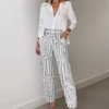 Clio – Stijlvolle 2-Delige Damesoutfit met Witte Blouse en Geometrische Broek
