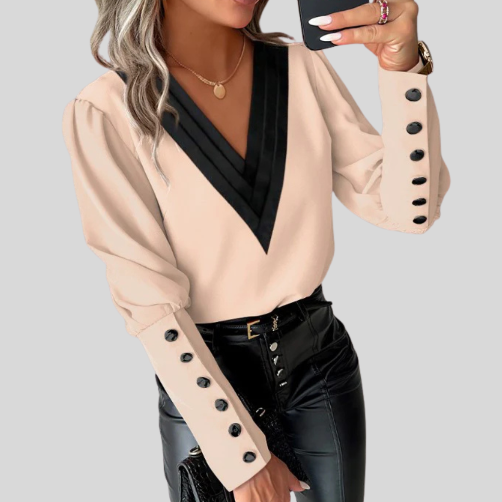 Damesblouse met knoopjes en gigotmouwen