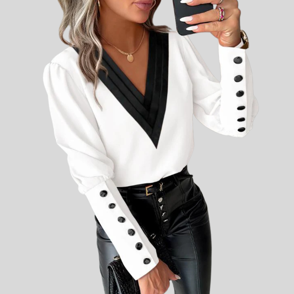 Damesblouse met knoopjes en gigotmouwen