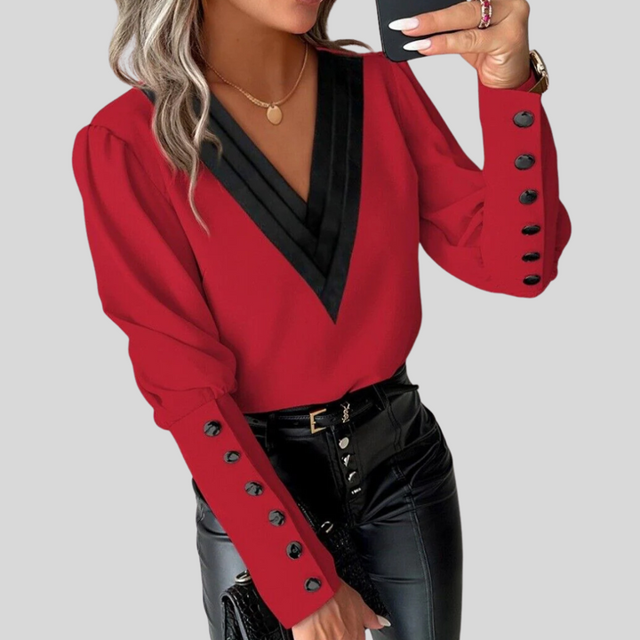 Damesblouse met knoopjes en gigotmouwen