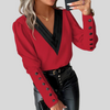 Damesblouse met knoopjes en gigotmouwen