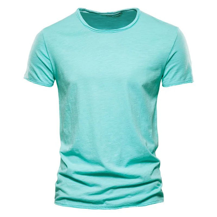 Comfort en Stijl in Eén T-shirt
Ervaar ultiem draagcomfort met dit ademende katoenen zomer T-shirt, ontworpen voor de moderne man die functionaliteit en stijl naadloos wil combineren. Perfect voor warme dagen, biedt dit T-shirt een frisse uitstraling zonder in te leveren op comfort.

Belangrijkste Kenmerken:
Ademend Katoen: Gemaakt van hoogwaardige, luchtige katoenstof die je koel houdt, zelfs op de warmste dagen.
Comfortabele Pasvorm: De zachte stof en de licht getailleerde snit zorgen voor een moeiteloos 