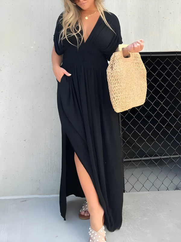 Lange maxi-jurk met split en V-hals