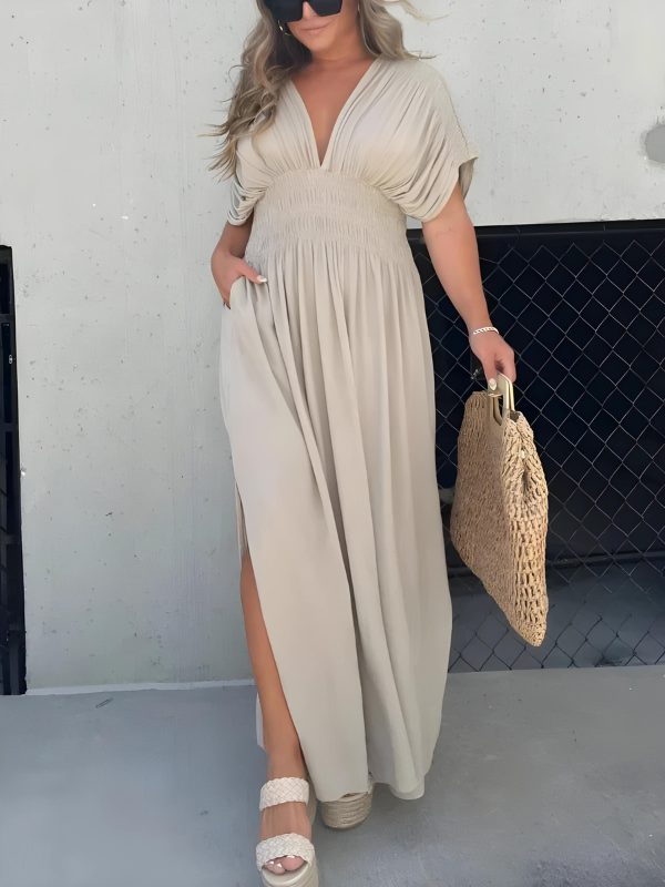 Lange maxi-jurk met split en V-hals