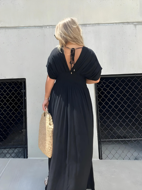 Lange maxi-jurk met split en V-hals