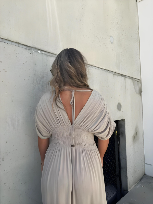 Lange maxi-jurk met split en V-hals