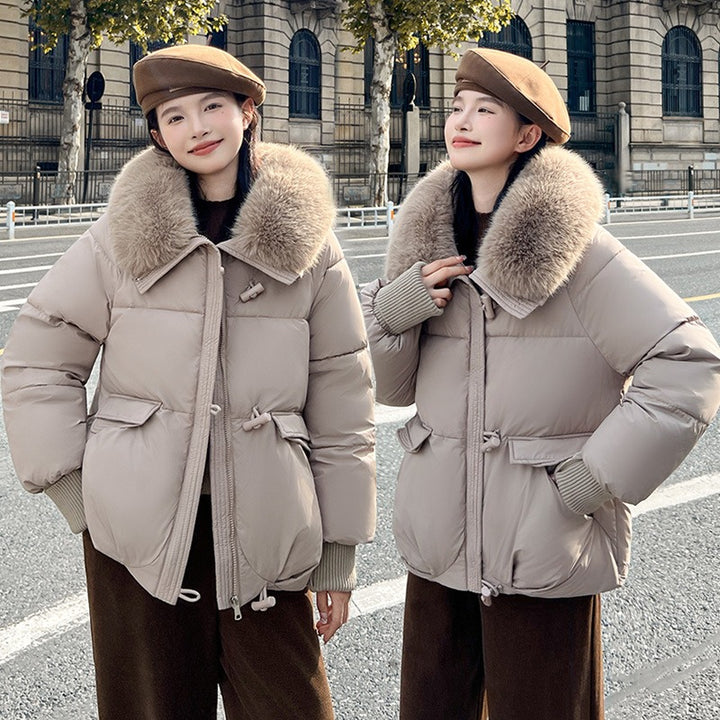 Knusse puffer winterjas met bontkraag - Milda