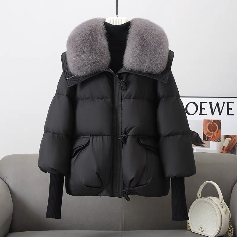 Knusse puffer winterjas met bontkraag - Milda