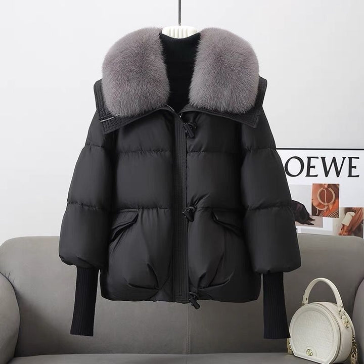 Knusse puffer winterjas met bontkraag - Milda