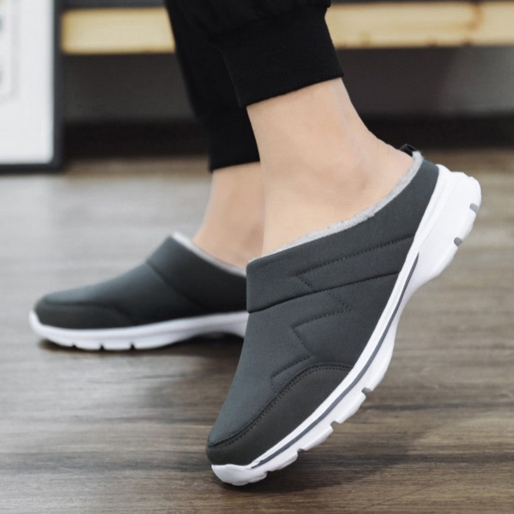 Orthopedische pantoffels voor heren, ideaal voor herfst- en winterdagen, met ergonomisch voetbed en zachte voering voor maximaal comfort.