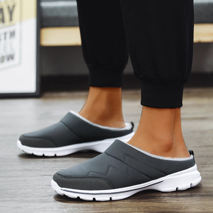 Orthopedische pantoffels voor heren, ideaal voor herfst- en winterdagen, met ergonomisch voetbed en zachte voering voor maximaal comfort.