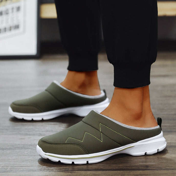 Orthopedische pantoffels voor heren, ideaal voor herfst- en winterdagen, met ergonomisch voetbed en zachte voering voor maximaal comfort.