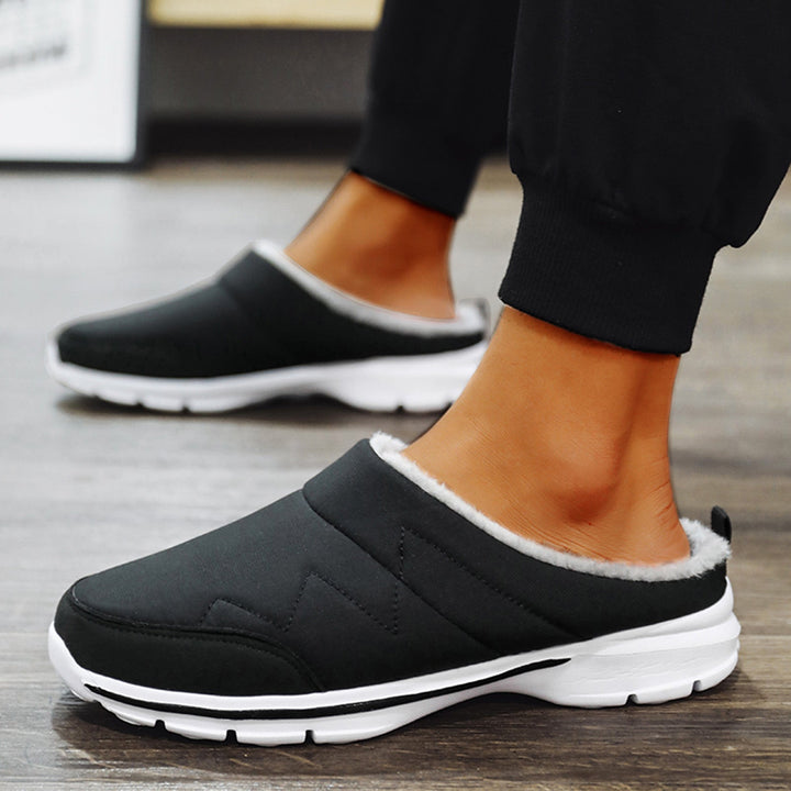 Orthopedische pantoffels voor heren, ideaal voor herfst- en winterdagen, met ergonomisch voetbed en zachte voering voor maximaal comfort.